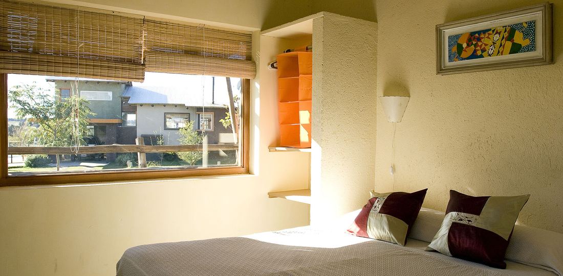 Dormitorio de una de las cabañas de Casaserena